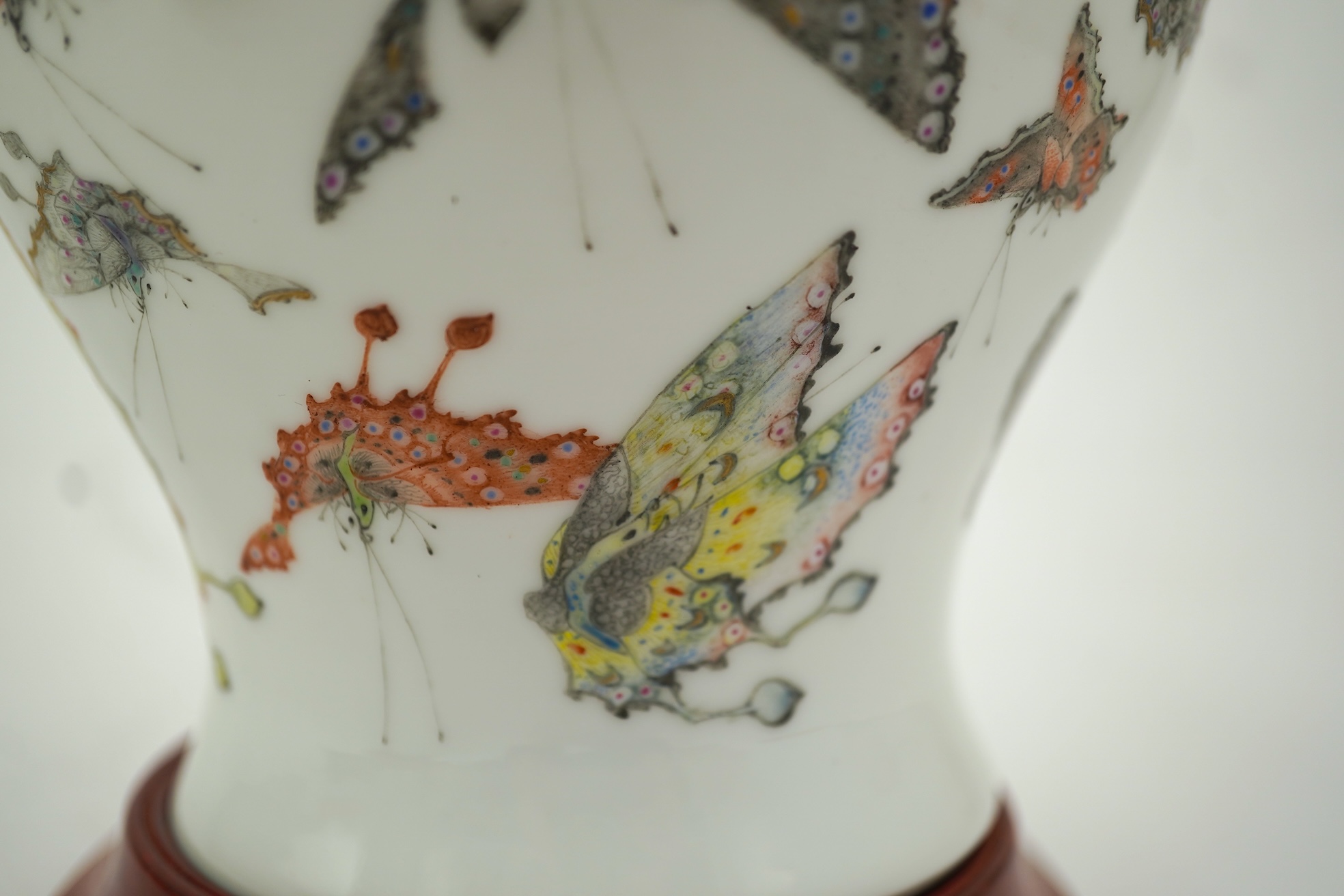 A Chinese enamelled porcelain ‘Hundred Butterfly’ vase, Qianlong mark, Republic period